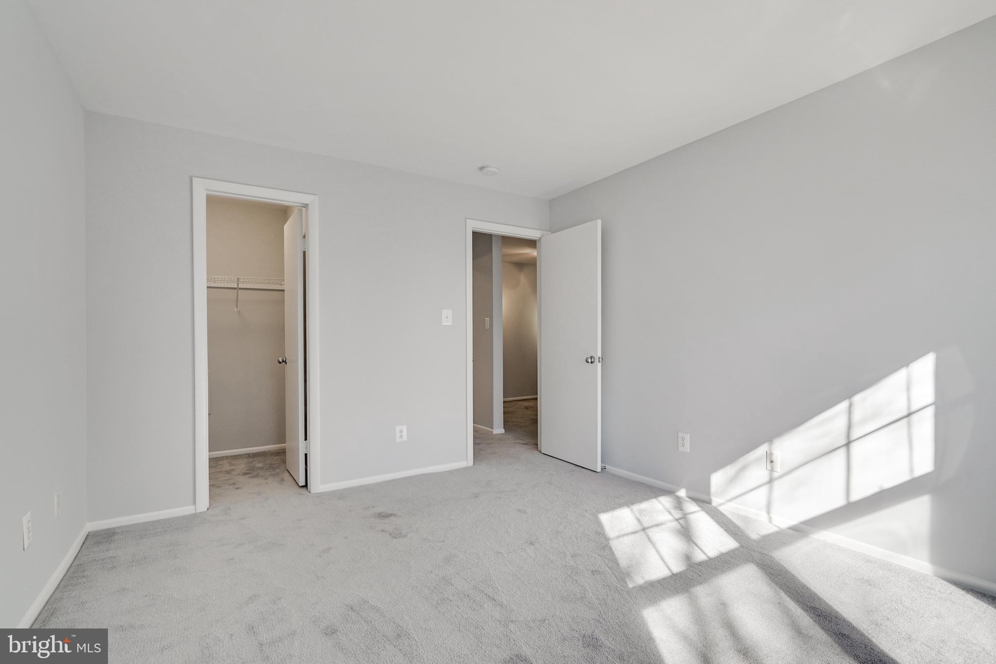 1781 Jonathan Way, Unit 1781I Reston, VA 20190 - Photo 14 of 48 a view of an empty room and window