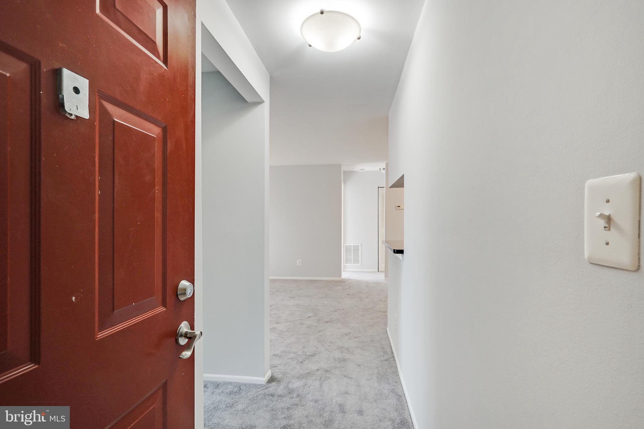 1781 Jonathan Way, Unit 1781I Reston, VA 20190 - Photo 3 of 48 a view of a hallway with closet