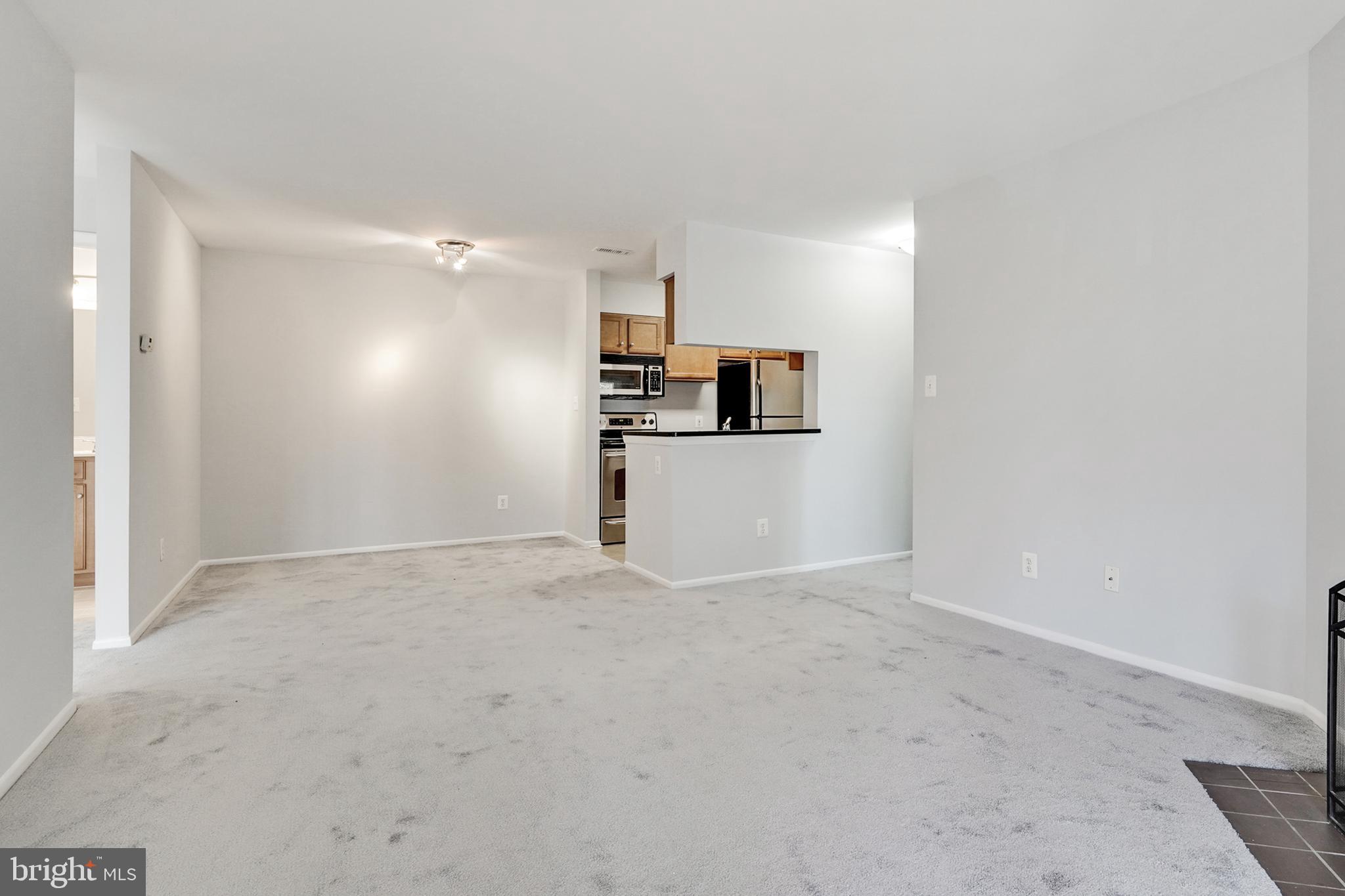 1781 Jonathan Way, Unit 1781I Reston, VA 20190 - Photo 8 of 48 a view of a kitchen with a sink