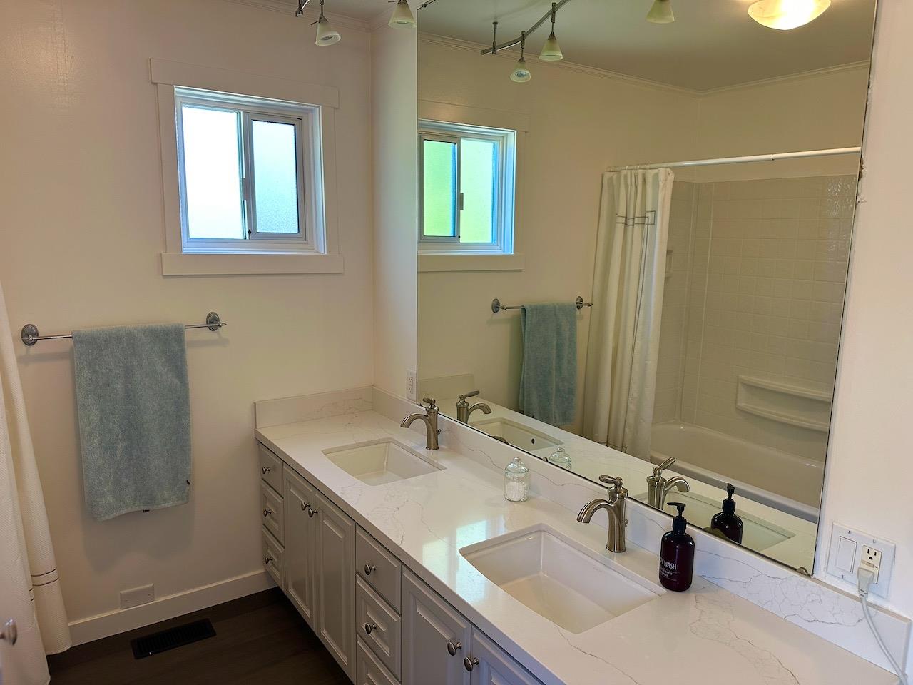 466 Thomson Lane Copperopolis, CA 95228 - Photo 17 of 47 a bathroom with double vanity sink and a mirror