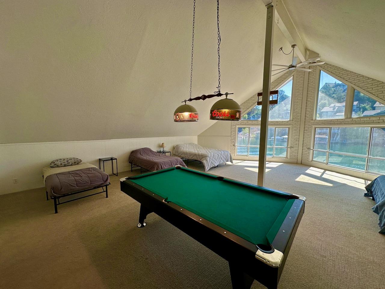 466 Thomson Lane Copperopolis, CA 95228 - Photo 23 of 47 a room with pool table and windows