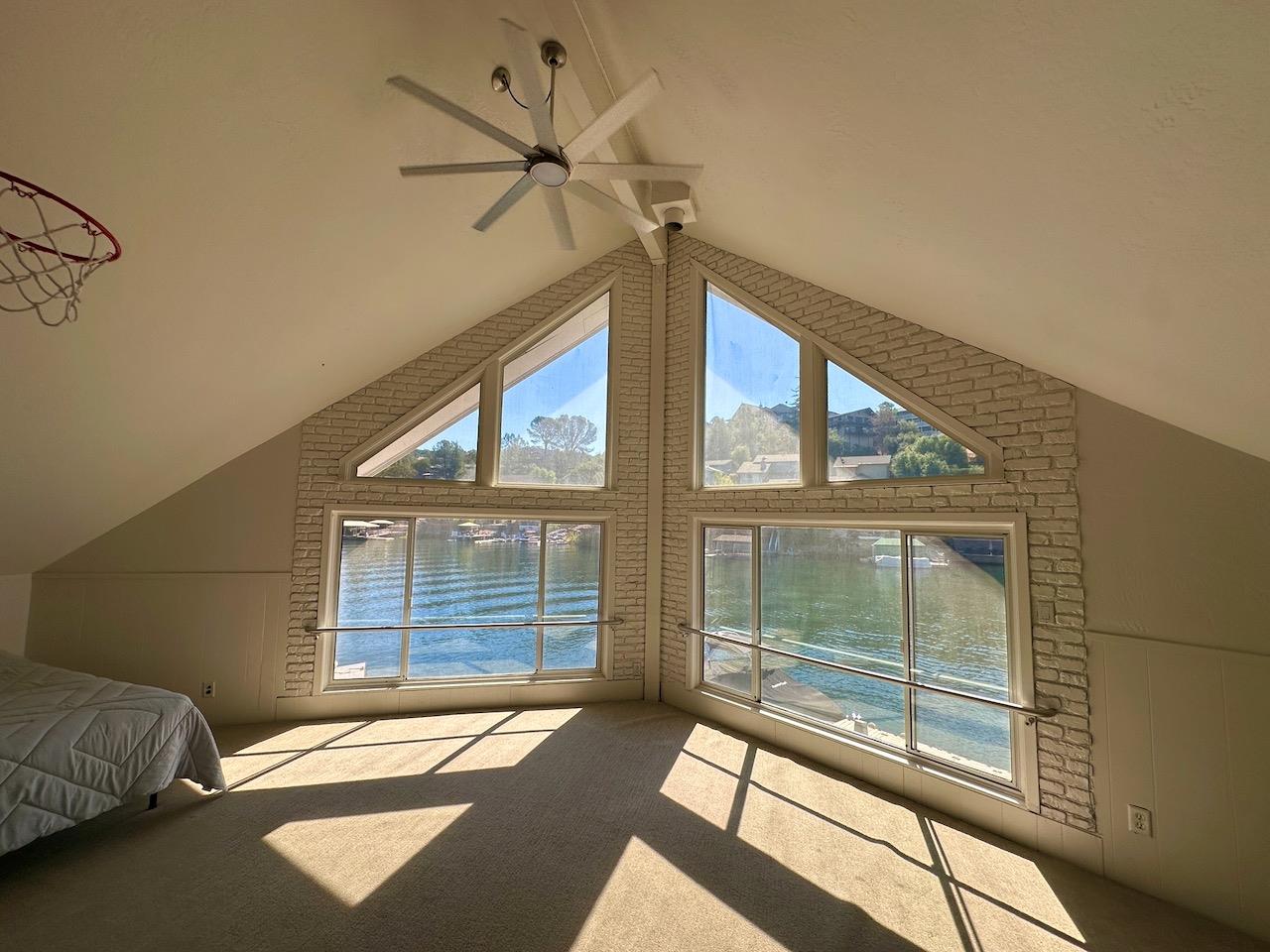 466 Thomson Lane Copperopolis, CA 95228 - Photo 24 of 47 a view of a livingroom with a ceiling fan and a window