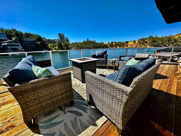 a view of a roof deck with couches