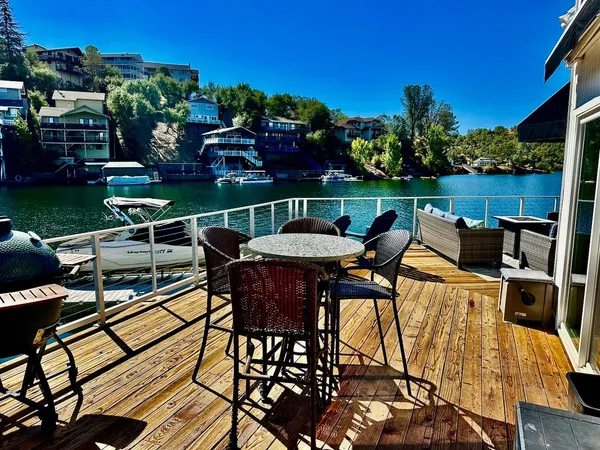 a patio with tables and chairs