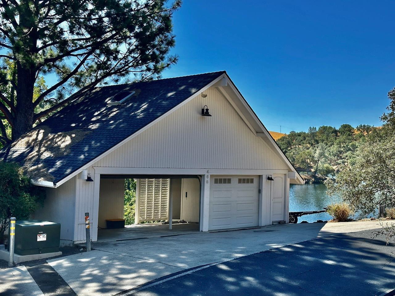 466 Thomson Lane Copperopolis, CA 95228 - Photo 38 of 47 a front view of a house with a garage