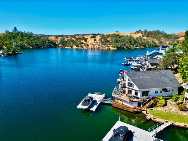an aerial view of a house with a garden