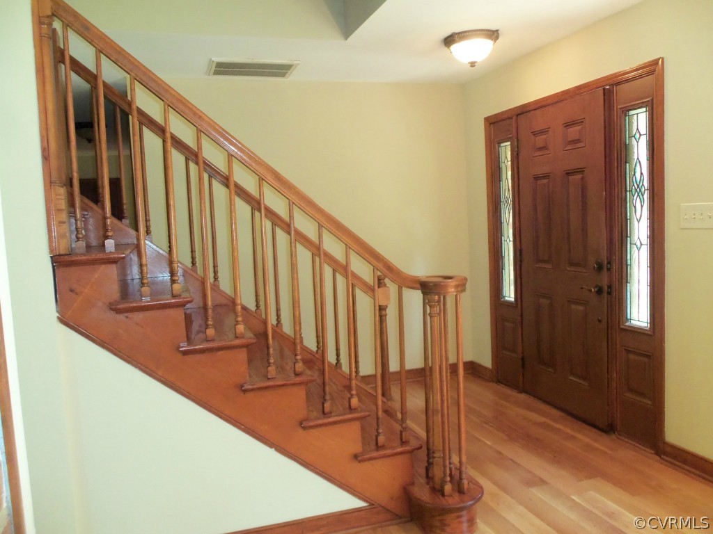 2155 Hunters Mill Road Powhatan, VA 23139 - Photo 6 of 24 Foyer - Wood staircase and ornate entry door