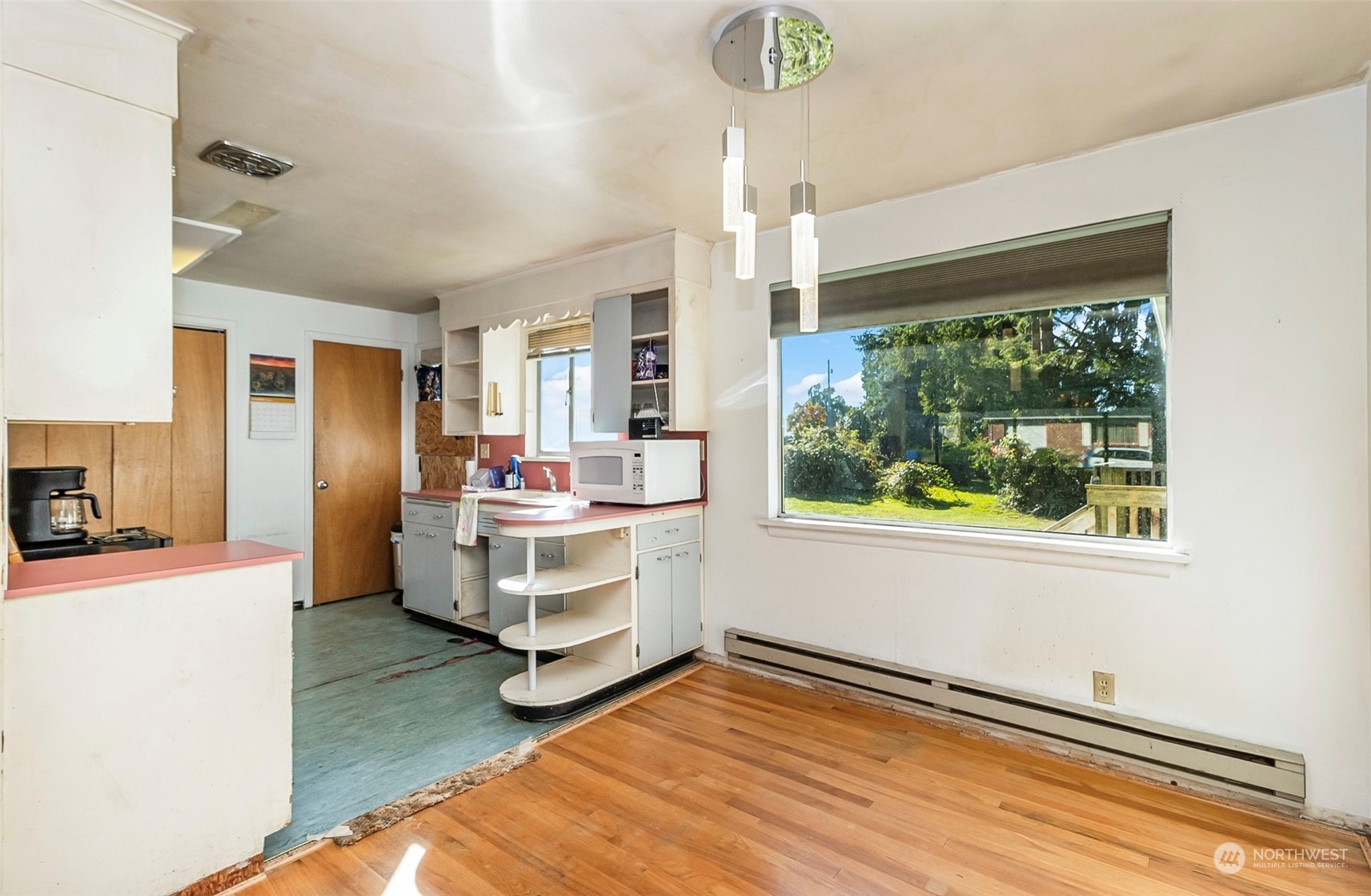 2416 6th Street Everett, WA 98201 - Photo 25 of 36 a view of kitchen with livingroom and window