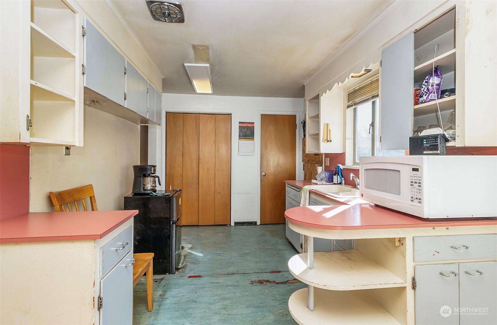 2416 6th Street Everett, WA 98201 - Photo 27 of 36 a bathroom with a sink a toilet and shower