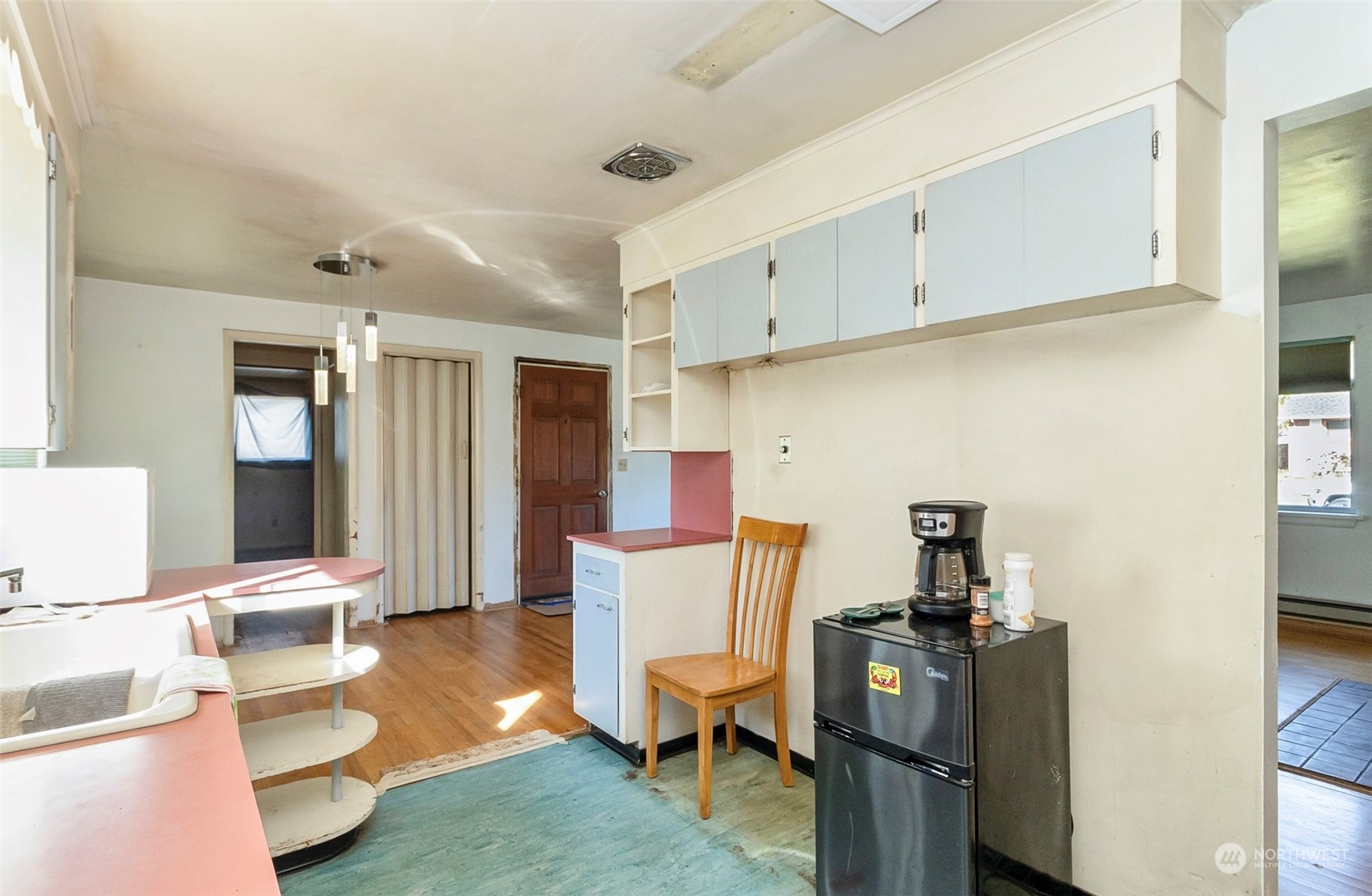 2416 6th Street Everett, WA 98201 - Photo 29 of 36 a living room with furniture and a table