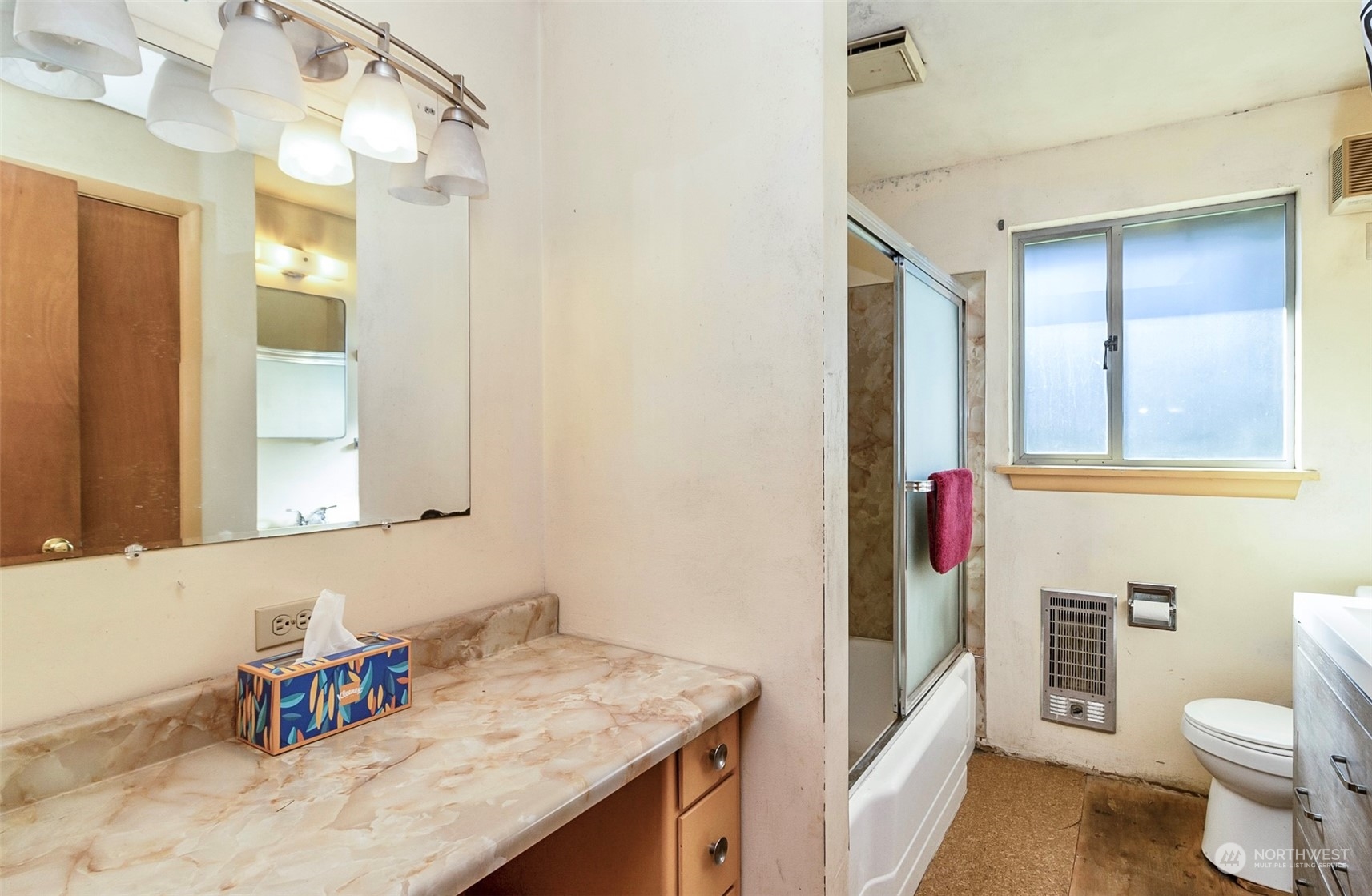 2416 6th Street Everett, WA 98201 - Photo 8 of 36 a bathroom with a granite countertop sink and a mirror