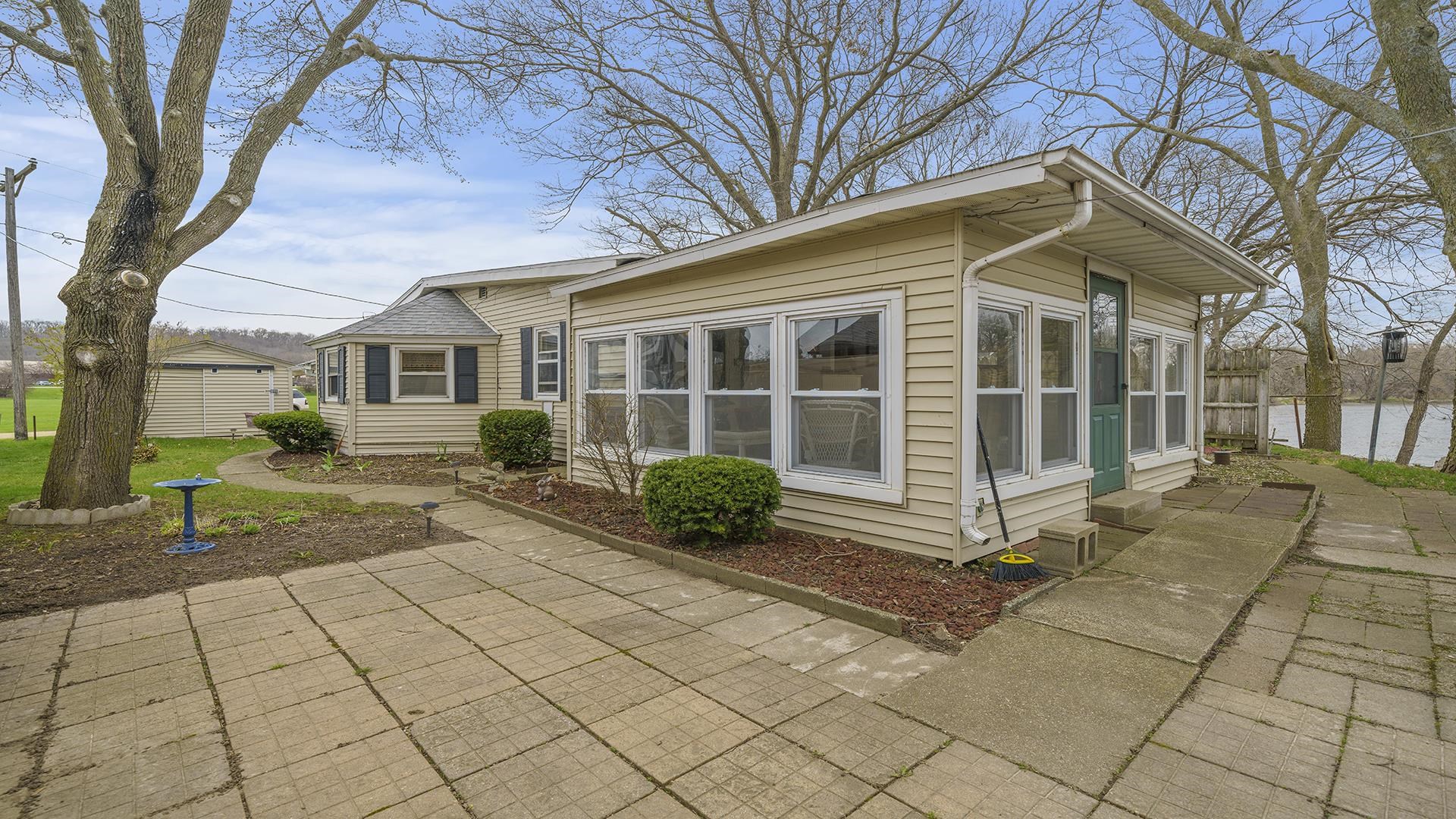 2687 South Snyder Road Oregon, IL 61061 - Photo 2 of 33 a view of a house with backyard