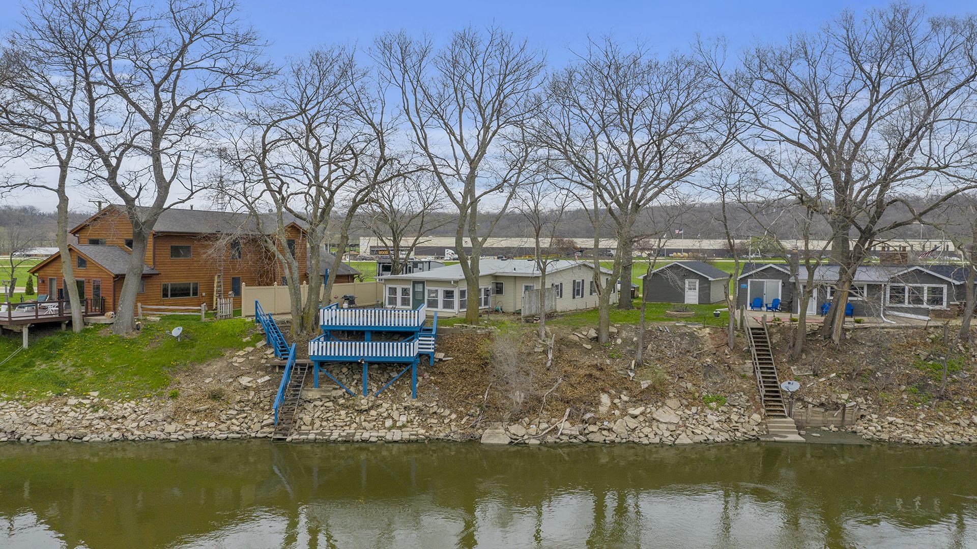 2687 South Snyder Road Oregon, IL 61061 - Photo 26 of 33 a front view of a house with a yard with lake view
