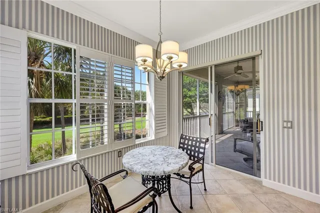 a view of a dining room and furniture window and outside view