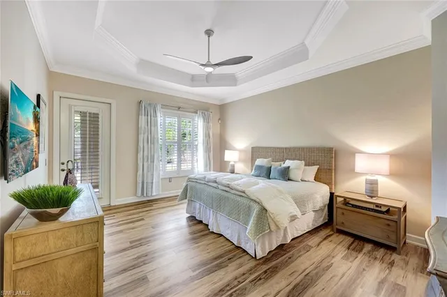 a bedroom with bed and a couch