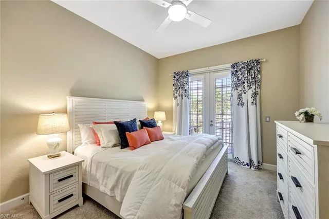 a bathroom with a granite countertop sink a toilet and bathtub