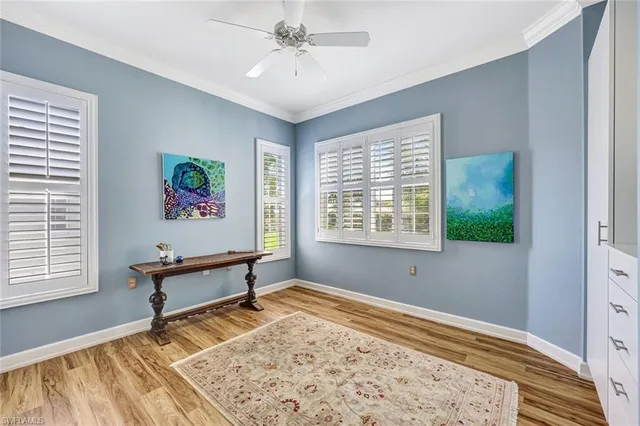 a bathroom with a shower sink vanity mirror and toilet