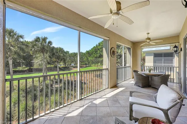 a view of balcony with furniture