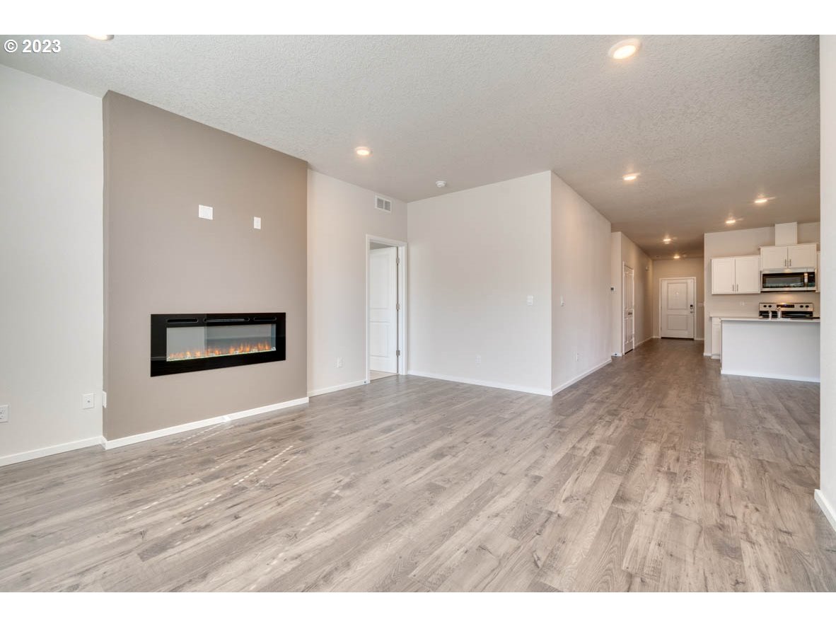 3492 Southeast Olvera Avenue Gresham, OR 97080 - Photo 14 of 23 a view of empty room with wooden floor