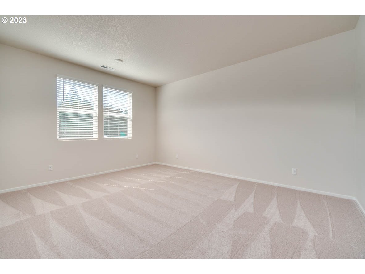 3492 Southeast Olvera Avenue Gresham, OR 97080 - Photo 16 of 23 a view of an empty room with a window