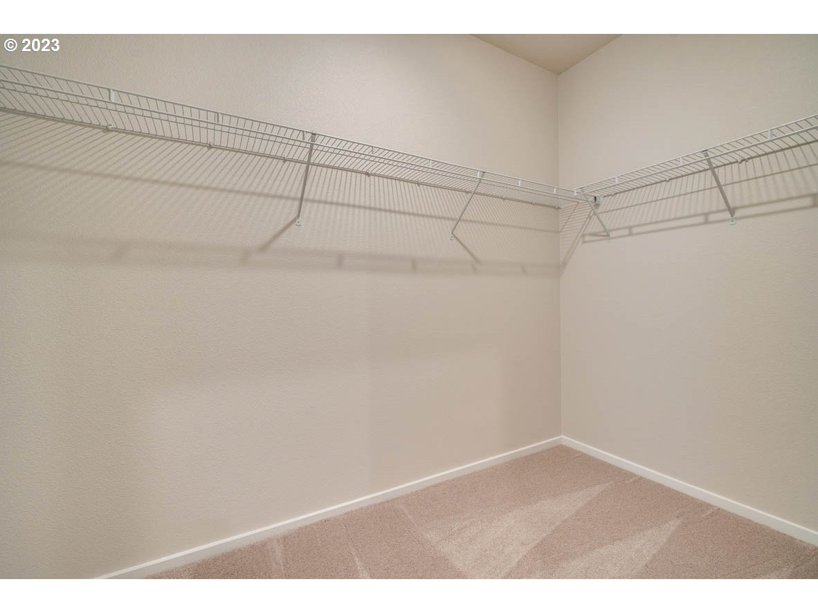 3492 Southeast Olvera Avenue Gresham, OR 97080 - Photo 19 of 23 a view of a room with racks on the wall