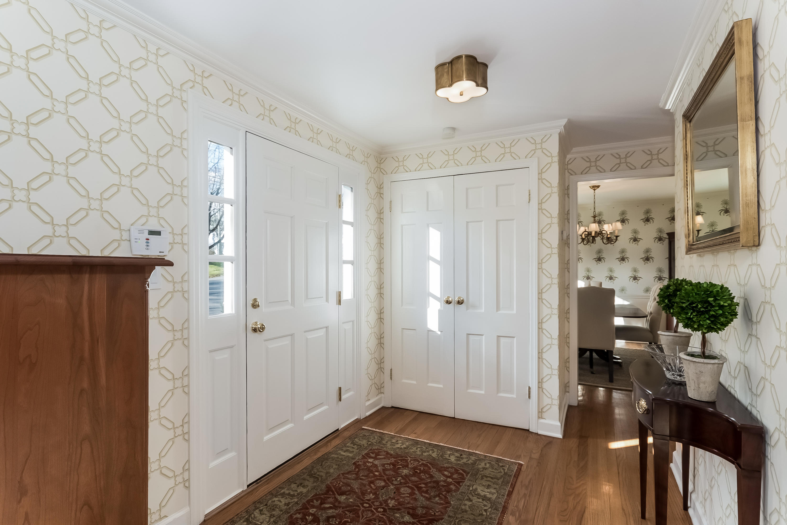 15 Wilson Ridge Road Darien, CT 06820 - Photo 4 of 42 a view of a hallway and dining room