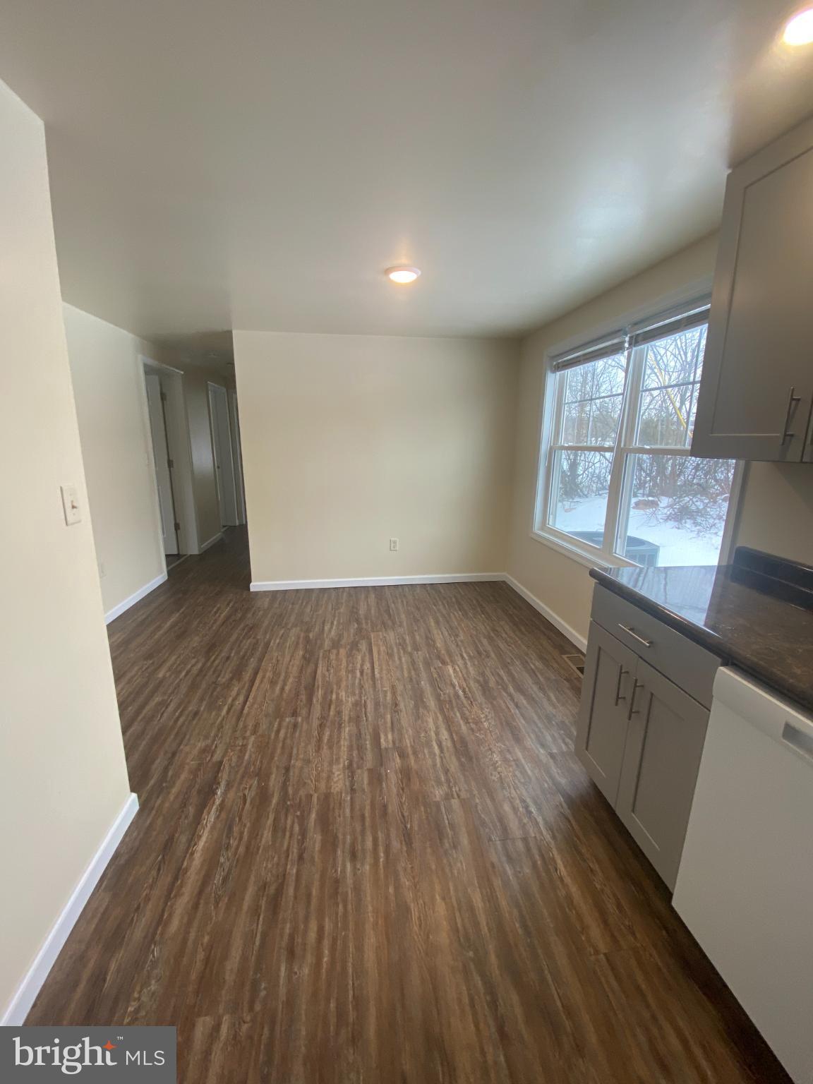 71 Boddy Lane Keyser, WV 26726 - Photo 6 of 17 wooden floor in an empty room with a window