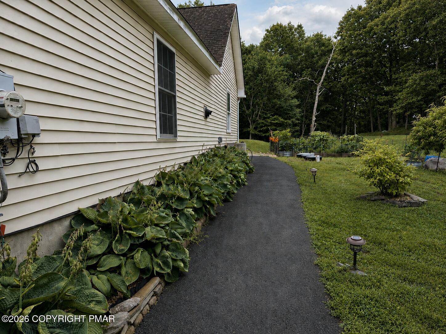 215 Maple Ridge Drive Hawley, PA 18428 - Photo 25 of 27 25 Path to Backyard