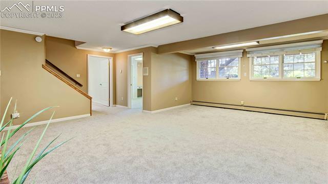 5417 Madera Road Colorado Springs, CO 80918 - Photo 29 of 43 Lower Level Living/Family Room