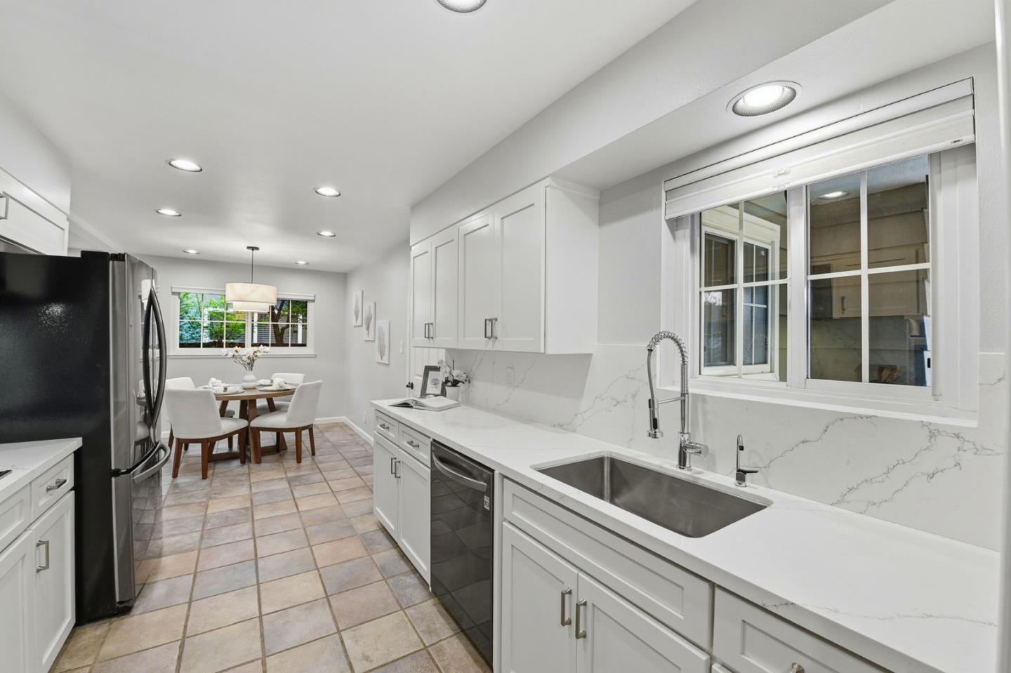 1663 Curtner Avenue San Jose, CA 95125 - Photo 6 of 57 a kitchen with a sink stainless steel appliances and cabinets