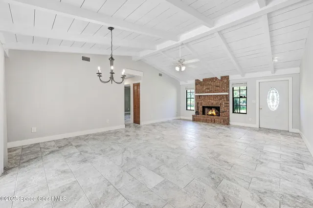 a view of a livingroom with a fireplace