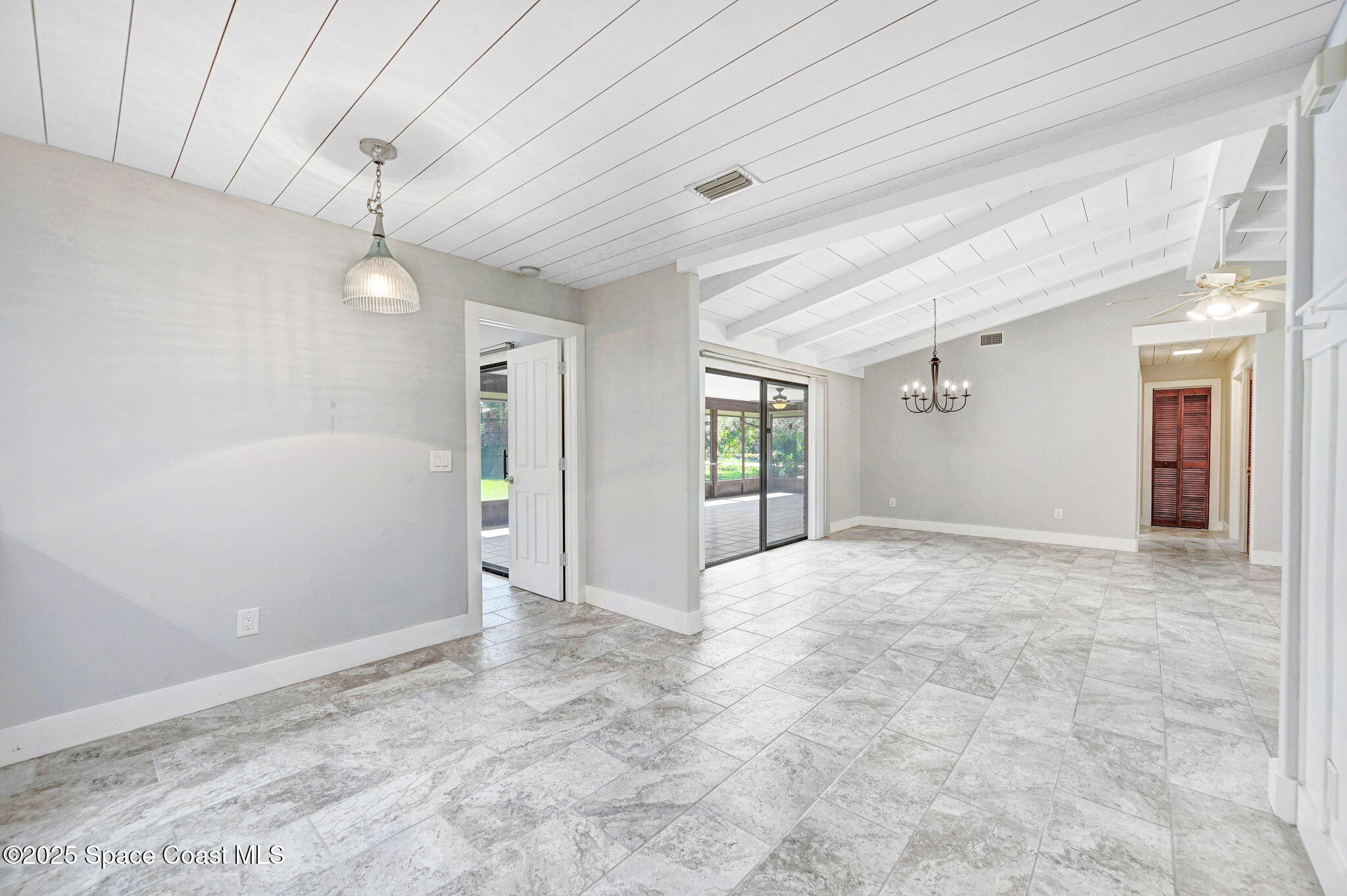 3301 Grant Road Grant-Valkaria, FL 32949 - Photo 12 of 56 a view of an empty room with a window