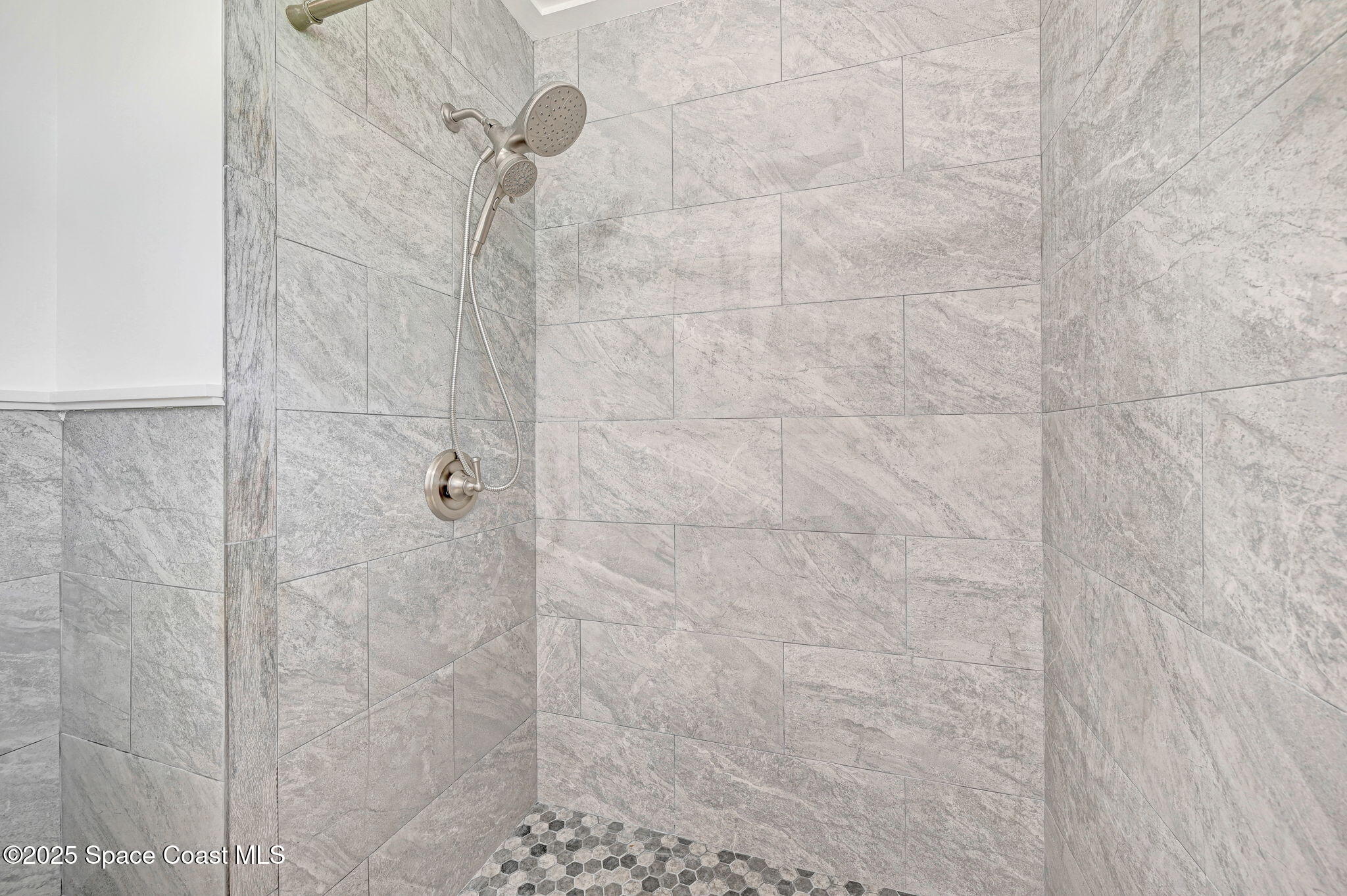 3301 Grant Road Grant-Valkaria, FL 32949 - Photo 23 of 56 a bathroom with a shower