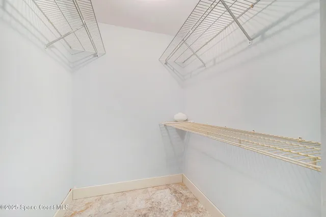 a view of a room with racks on the wall