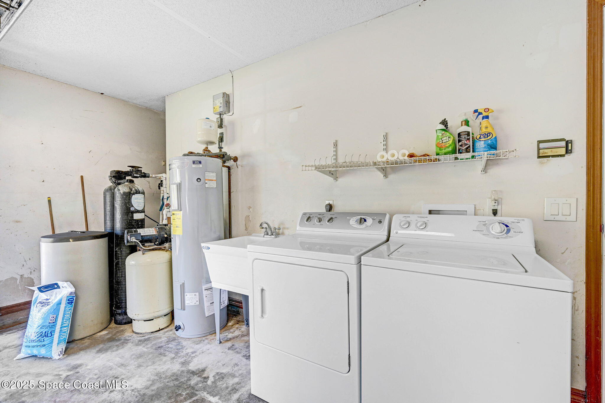 3301 Grant Road Grant-Valkaria, FL 32949 - Photo 33 of 56 a utility room with dryer and washer