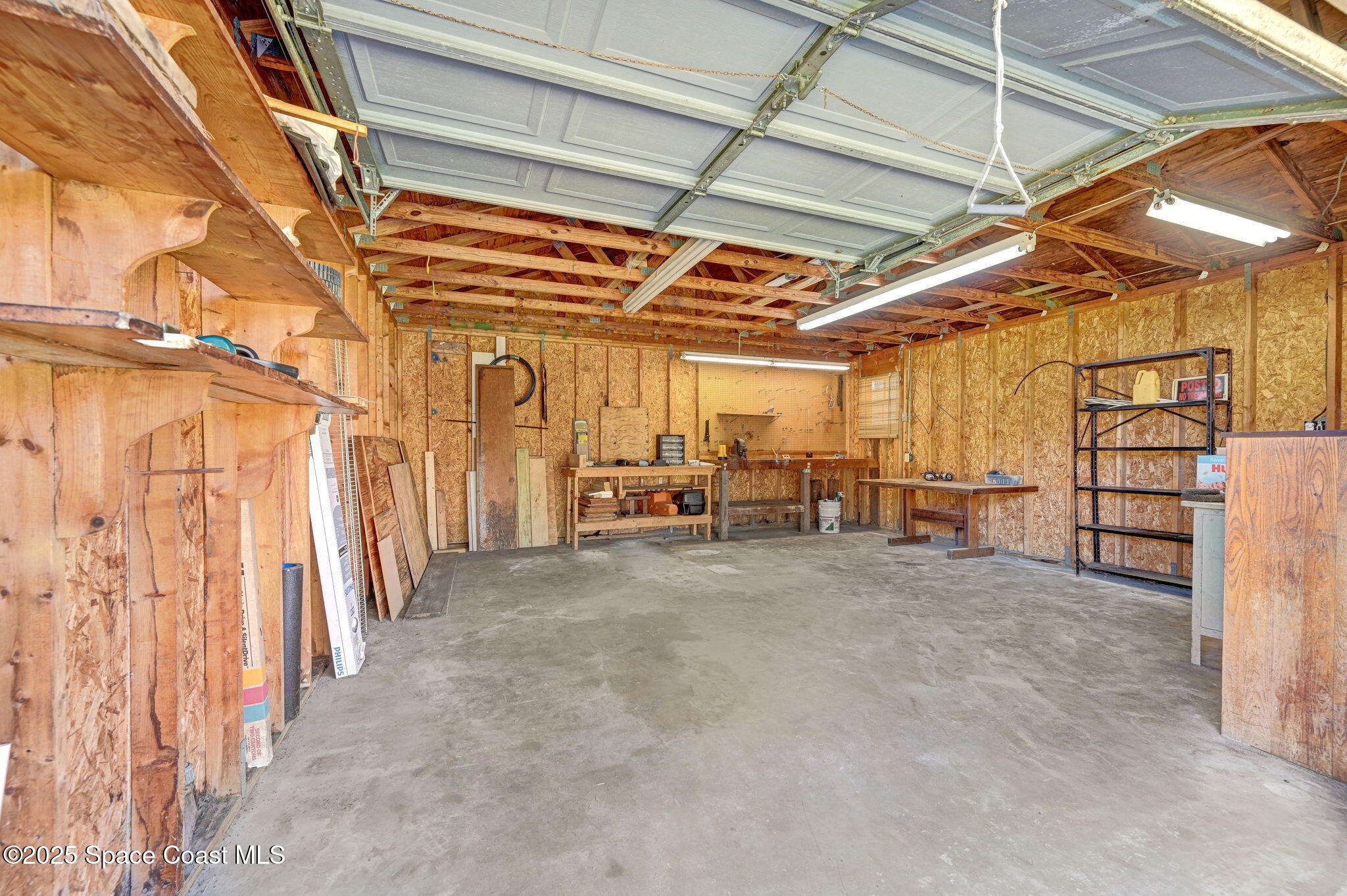 3301 Grant Road Grant-Valkaria, FL 32949 - Photo 36 of 56 a view of a room with wooden walls
