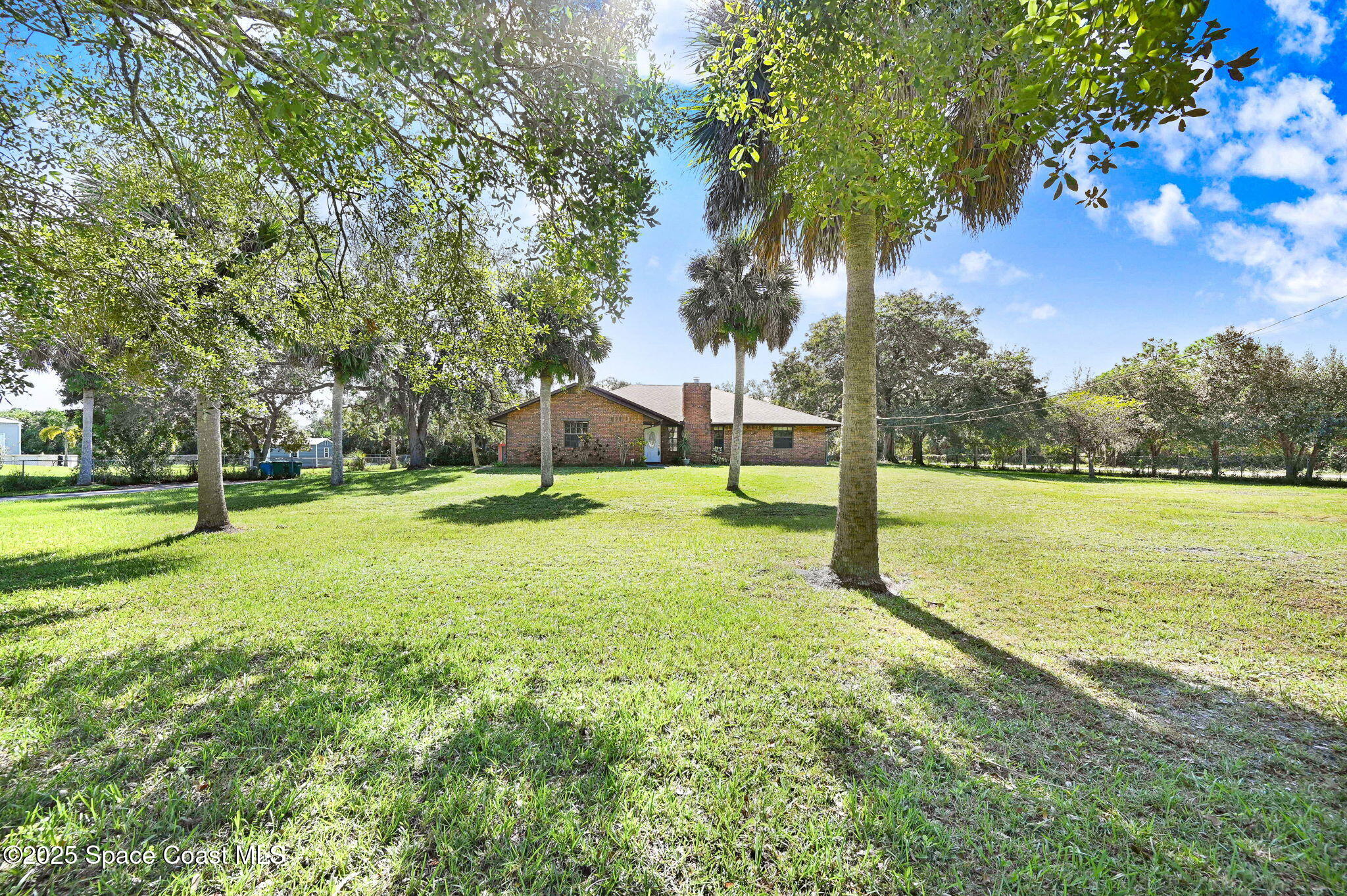 3301 Grant Road Grant-Valkaria, FL 32949 - Photo 42 of 56 a view of a park with large trees