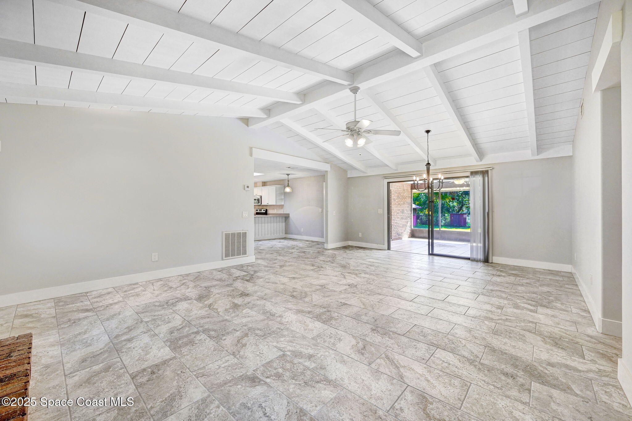 3301 Grant Road Grant-Valkaria, FL 32949 - Photo 7 of 56 a view of a livingroom with a stove