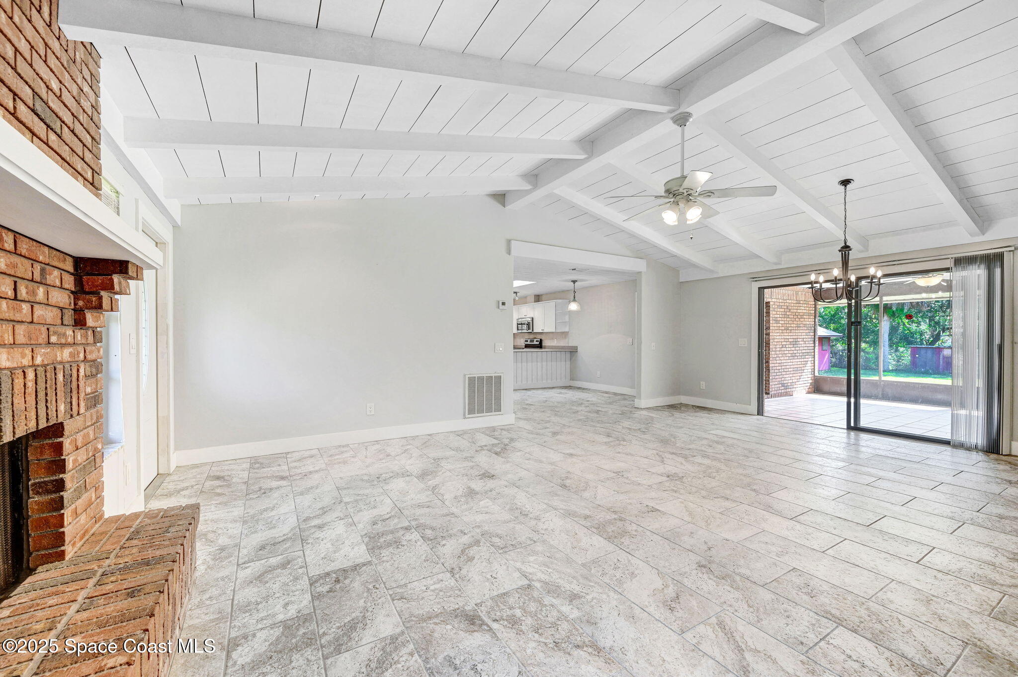3301 Grant Road Grant-Valkaria, FL 32949 - Photo 9 of 56 a view of an empty room with a window
