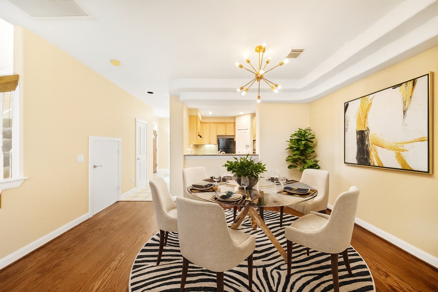 2406 Calumet Street Houston, TX 77004 - Photo 16 of 37 a view of a dining room with furniture a chandelier and wooden floor