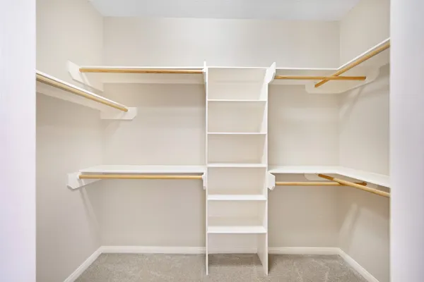 a view of an empty walk in closet