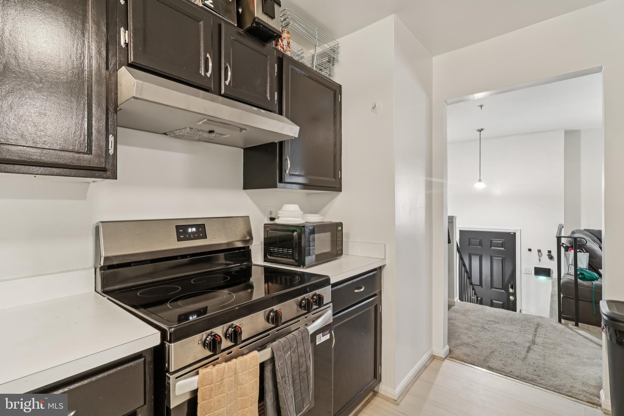1000 Ute Way Capitol Heights, MD 20743 - Photo 19 of 51 a kitchen with stainless steel appliances and cabinets