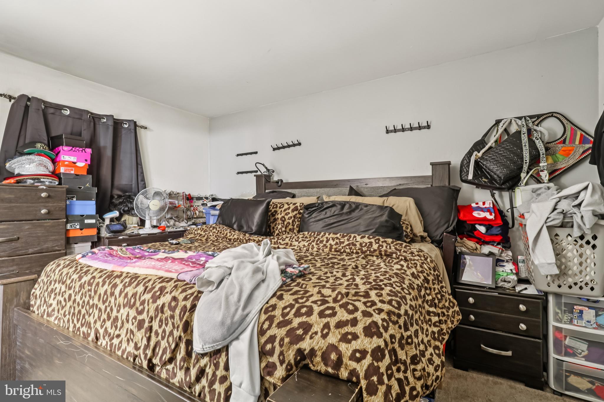 1000 Ute Way Capitol Heights, MD 20743 - Photo 21 of 51 a bedroom with bed and a mirror