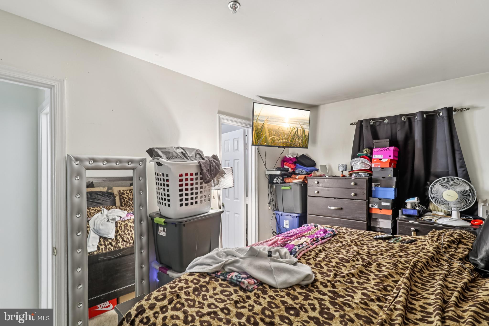 1000 Ute Way Capitol Heights, MD 20743 - Photo 22 of 51 a bed room with a bed and a television