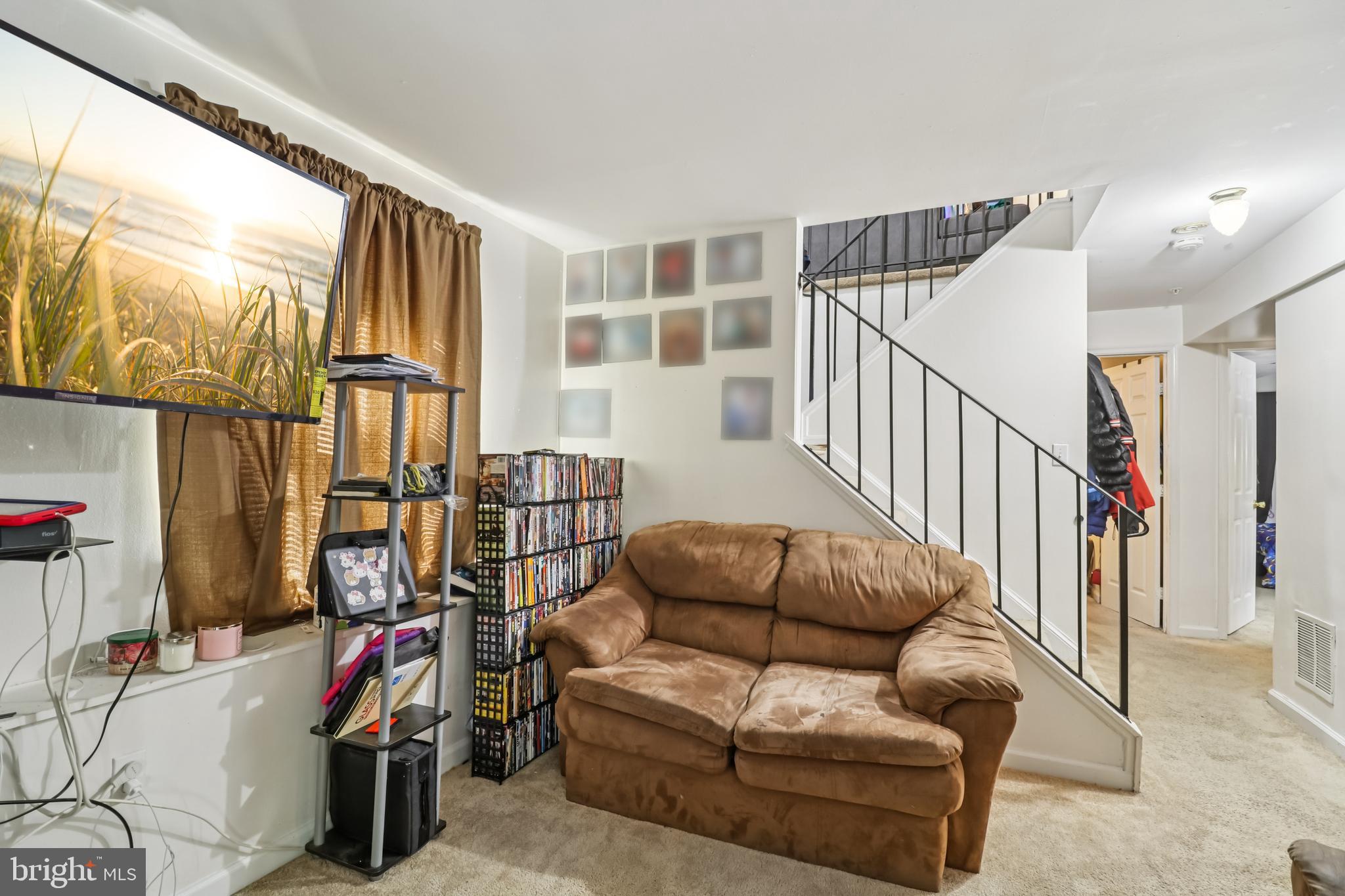 1000 Ute Way Capitol Heights, MD 20743 - Photo 31 of 51 a livingroom with furniture entryway and a window