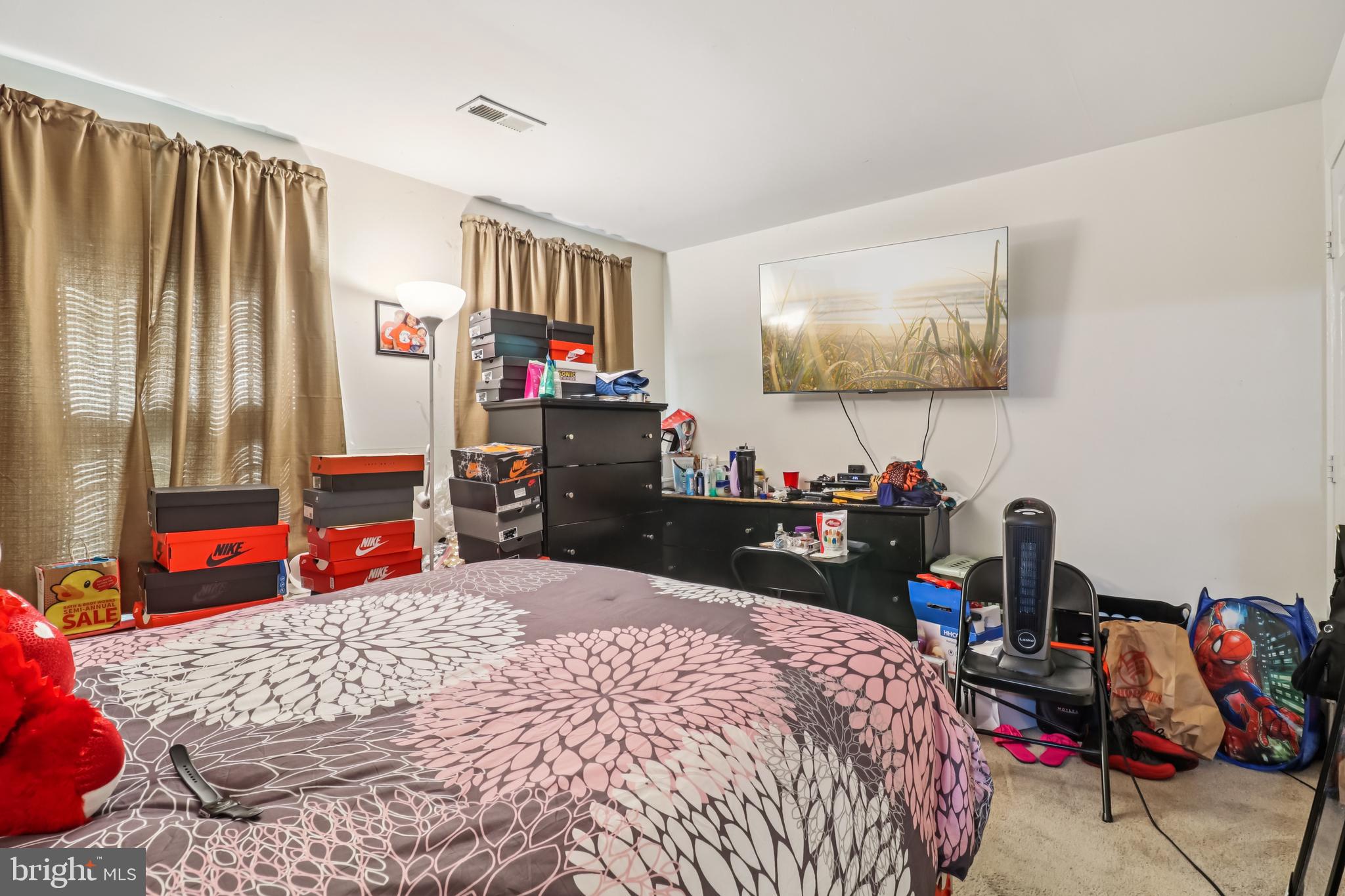 1000 Ute Way Capitol Heights, MD 20743 - Photo 35 of 51 a bedroom with bed and glass windows