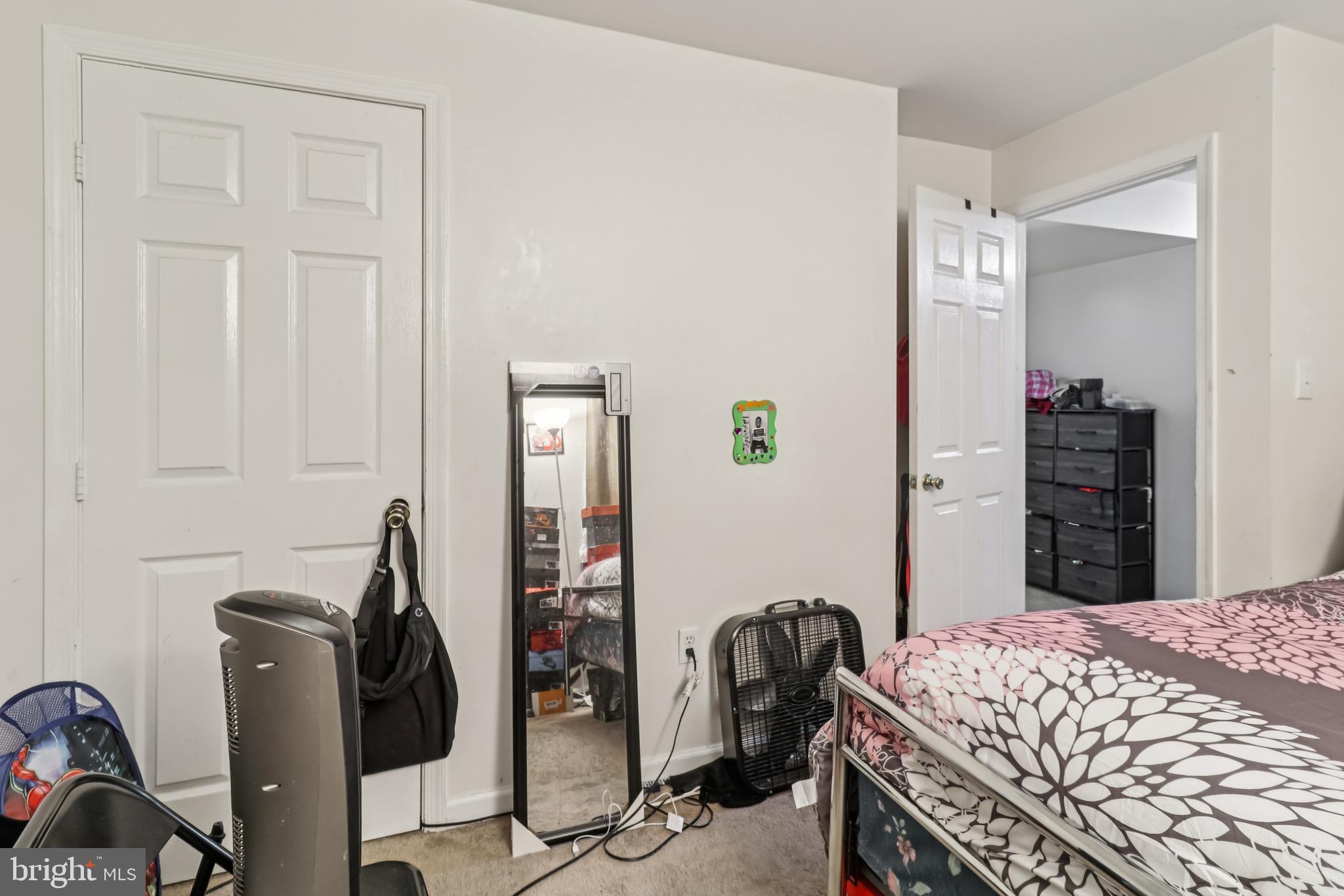 1000 Ute Way Capitol Heights, MD 20743 - Photo 36 of 51 a bedroom with bed and a closet