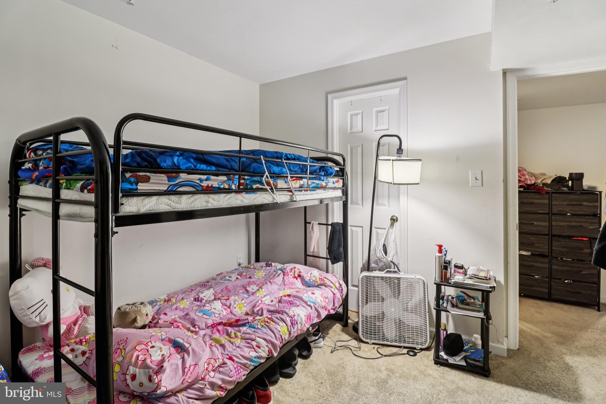 1000 Ute Way Capitol Heights, MD 20743 - Photo 39 of 51 a bedroom with a bed and a painting on the wall