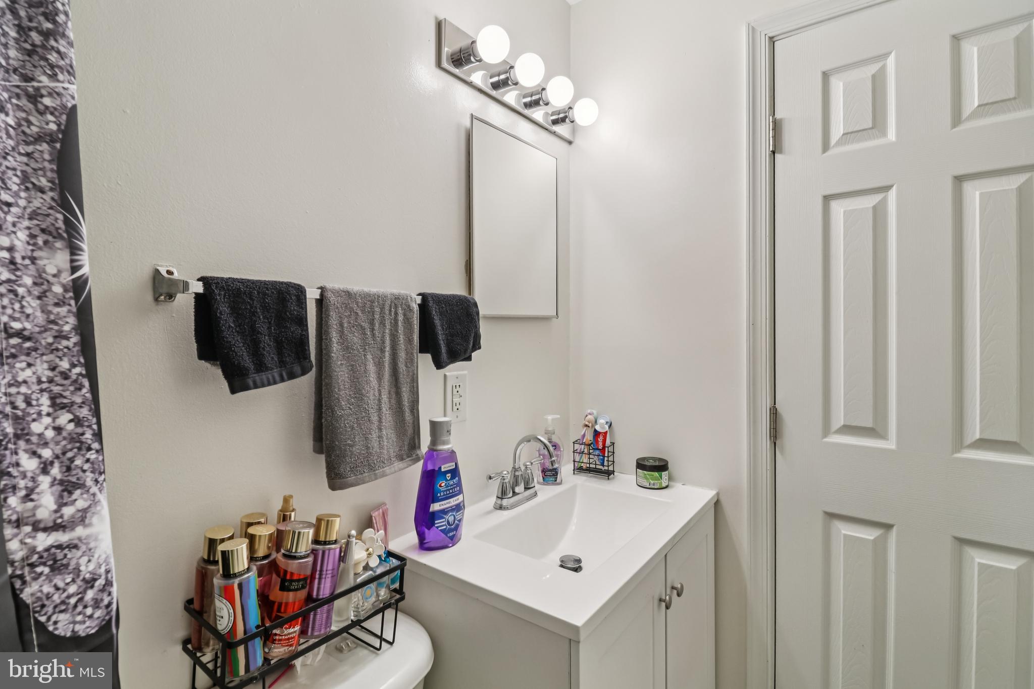 1000 Ute Way Capitol Heights, MD 20743 - Photo 41 of 51 a bathroom with a sink and a mirror