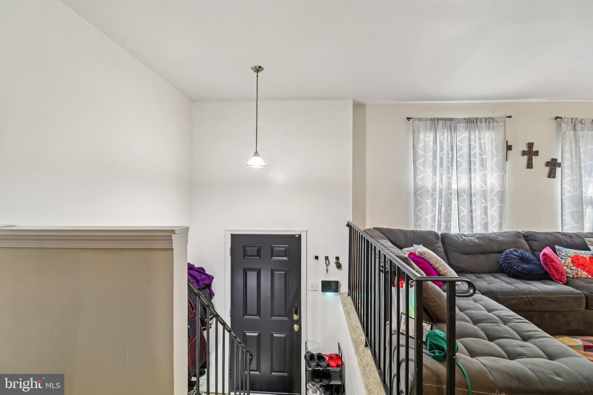 1000 Ute Way Capitol Heights, MD 20743 - Photo 9 of 51 a living room with furniture and a flat screen tv